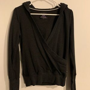 Active wear long sleeve cross-over sweater
